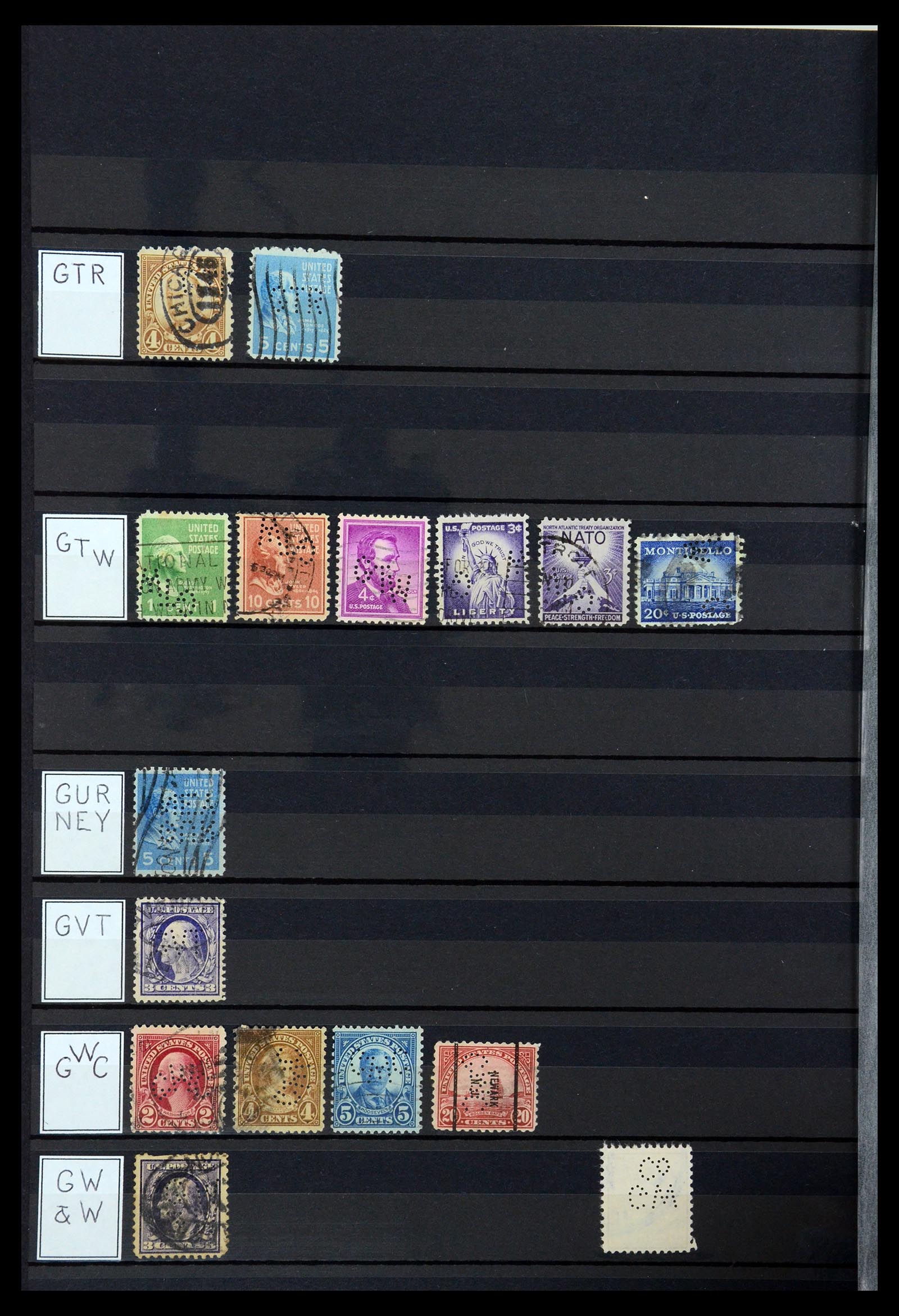 36388 060 - Postzegelverzameling 36388 USA perfins.