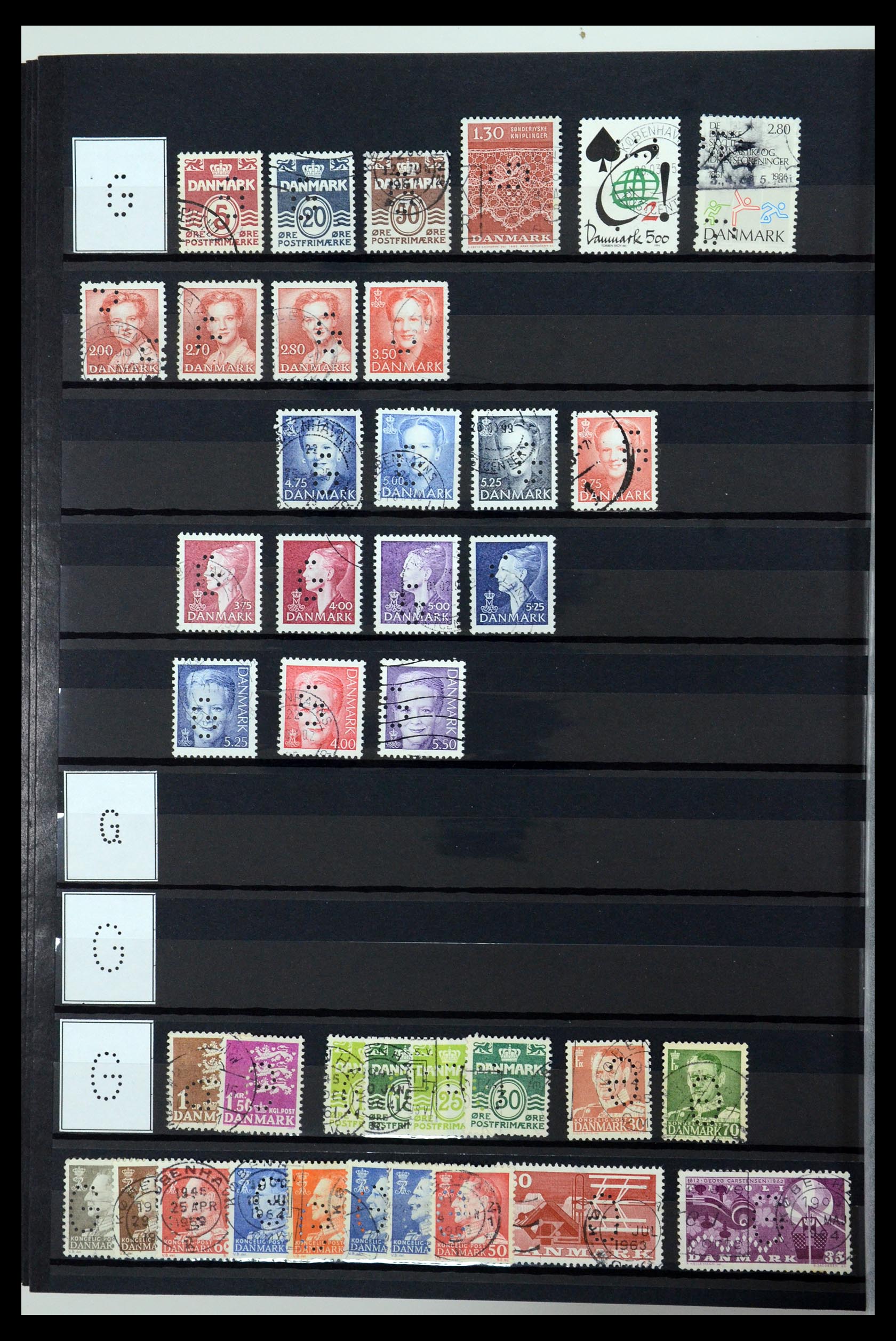 36396 057 - Postzegelverzameling 36396 Denemarken perfins.