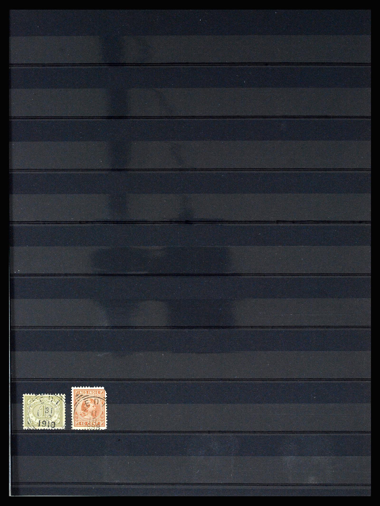 36512 085 - Stamp collection 36512 Nederlands Indië stempels 1872-1930.