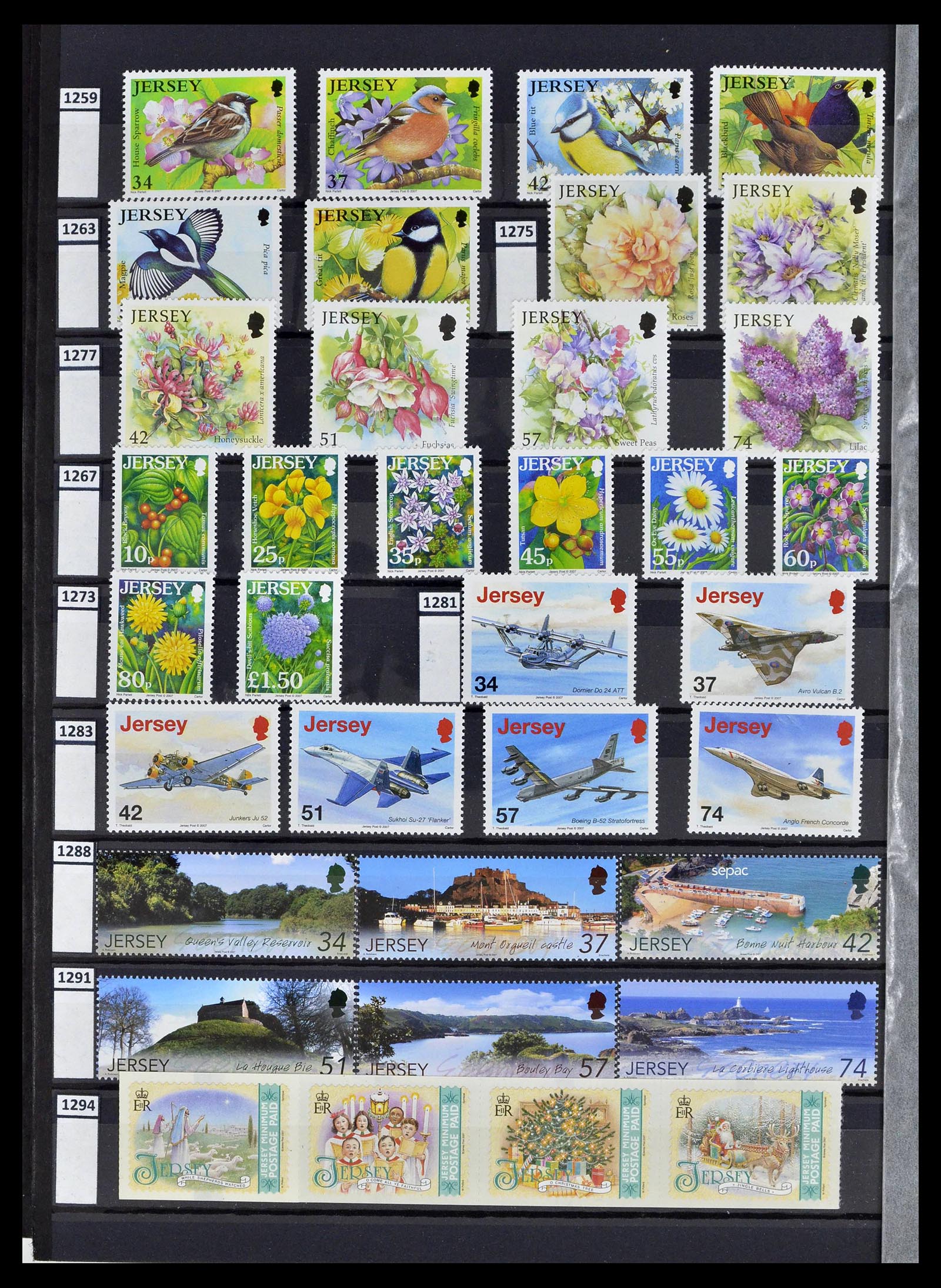 39197 0036 - Postzegelverzameling 39197 Kanaaleilanden 1941-2015.